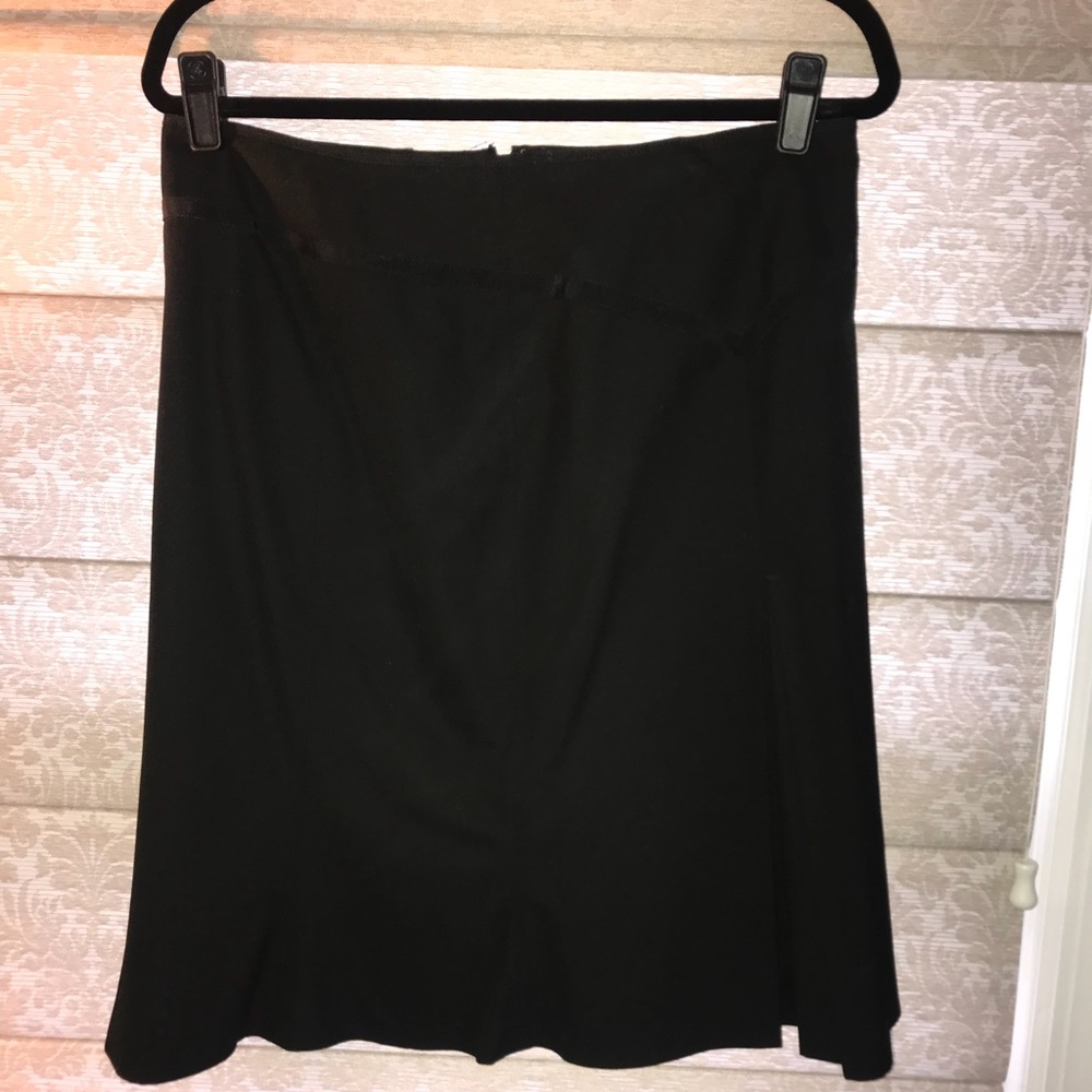 Limited black shirt with side pleated slit